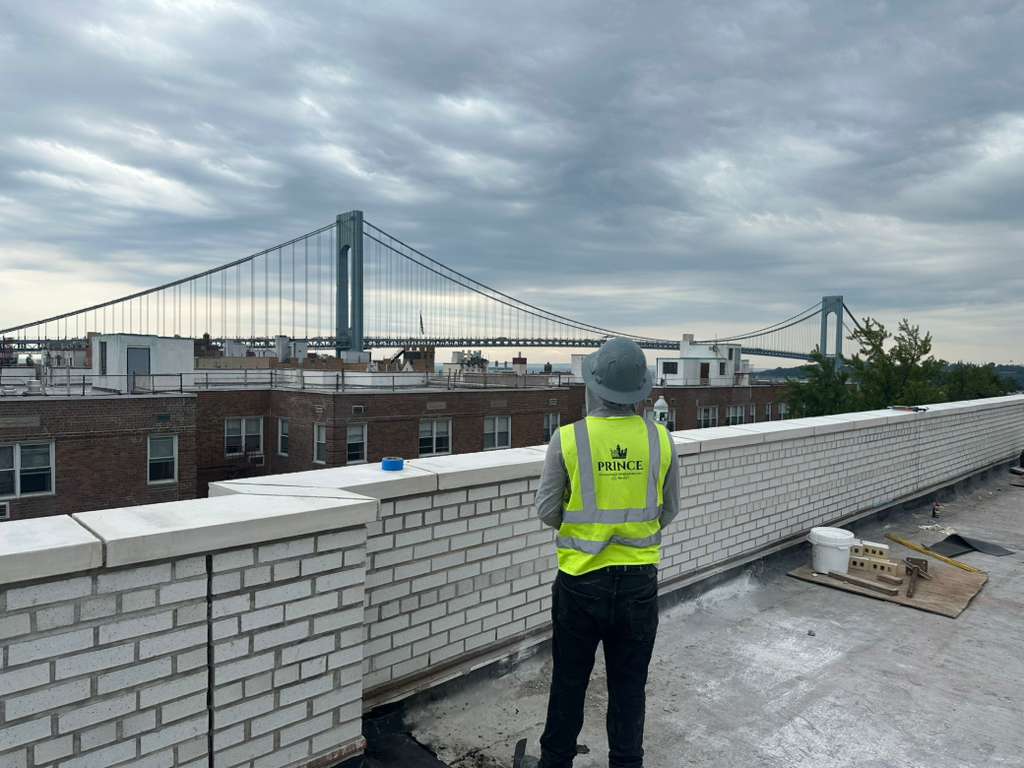 Prince Developers crew member on a New York rooftop restoration site